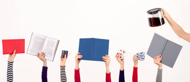 istock many hands up and holding coffee cup 1183561625