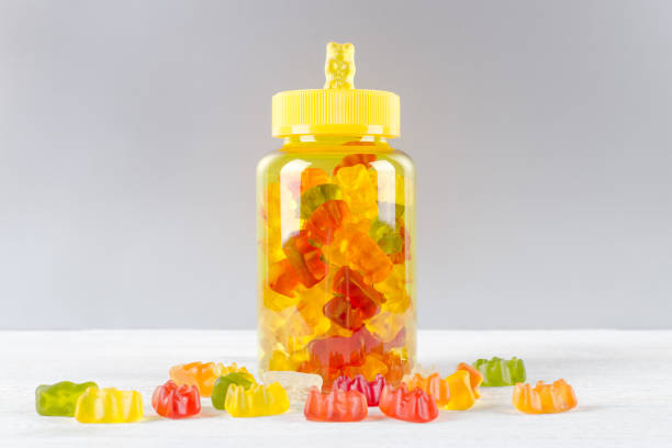 vitamins for children like jelly candy, on gray background