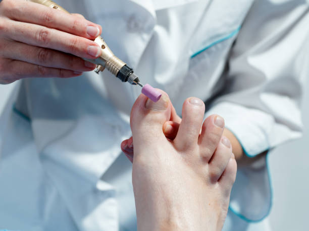 istock Male pedicure 1183563779