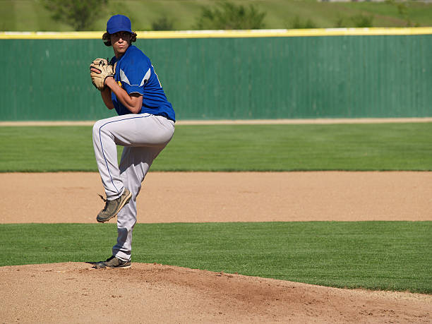 high school baseball pitcher stock photo