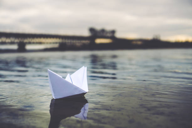 Paper figure on the river