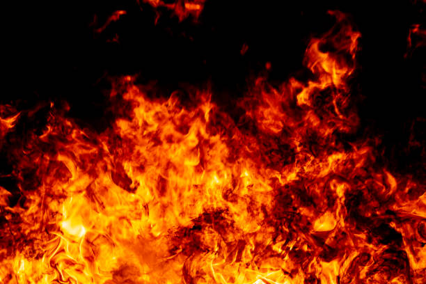 istock Abstract fire flame burn glowing on fuel in dark night background 1183568282