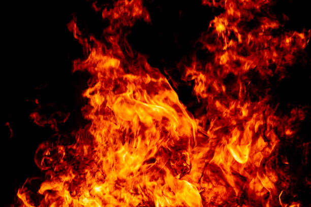 istock Abstract fire flame burn glowing on fuel in dark night background 1183568293