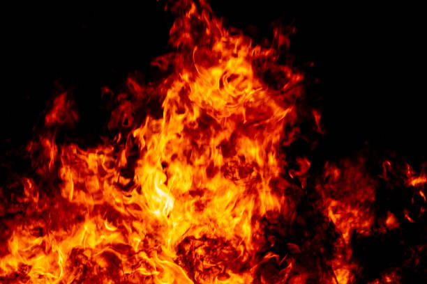 istock Abstract fire flame burn glowing on fuel in dark night background 1183568341