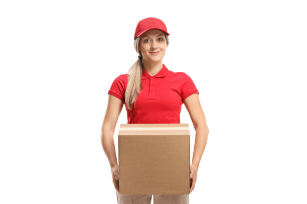 Female worker carrying a box