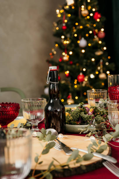 istock Christmas beer bottle on set table 1183568899