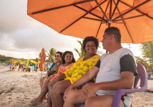 istock Tourists on the beach under a tent 1183570390