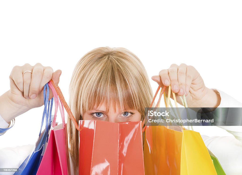 Mulher sorridente com sacos de compras - Foto de stock de 20-24 Anos royalty-free