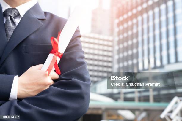Image Of A Man With A Educational Stock Photo - Download Image Now - Business, Diploma, Graduation