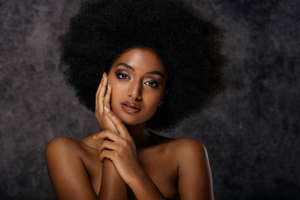 istock Beautiful afro woman 1183575088