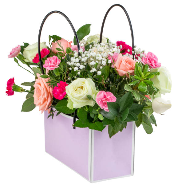 istock Gift box with beautiful flowers isolated on white background 1183575135