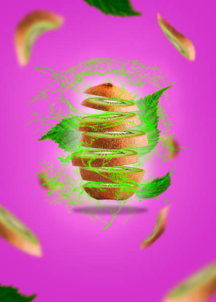 Kiwi levitation on a purple background with leaf levitating.