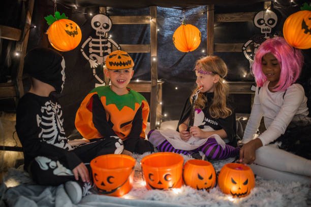 istock Kids on Halloween tent party 1183576559
