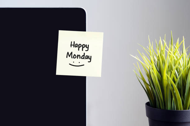istock Happy Monday Text on Sticky Note on Laptop Screen 1183577899