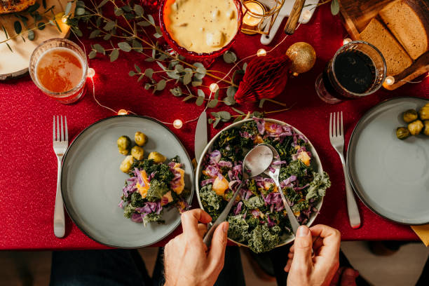 Christmas Food Smorgasbord kale salad Typical swedish scandinavian christmas smörgåsbord buffet food Photo taken from above overhead table top shot 
Kale salad, the healthy choice place setting table plate dining table stock pictures, royalty-free photos & images