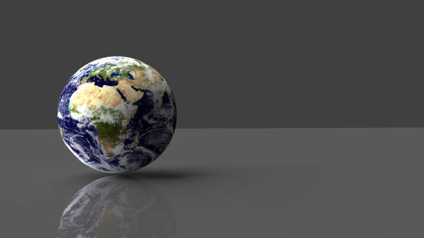 istock Planet Earth placed on grey glossy desk with reflection. 3D render. Elements of this image furnished by NASA. 1183581411