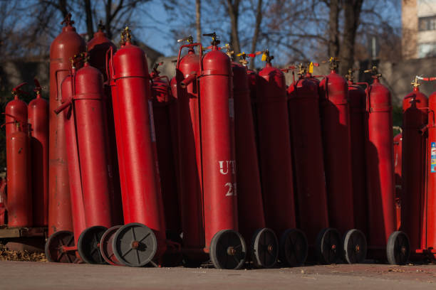 istock A lot of red fire extinguishers on service. 1183586668