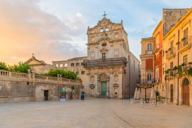 Baroque catholic church of Saint Lucia alla Badia at sunrise at the citycenter of Ortygia island in Siracusa in Sicily