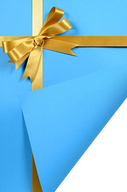 istock Blue and gold gift with curled corner 118359165