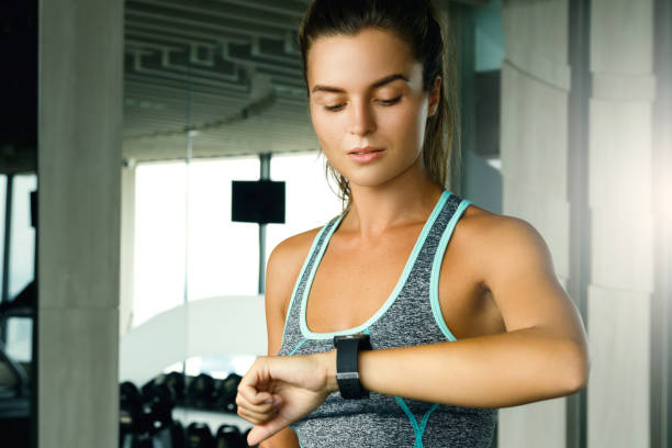 istock Woman in the gym 1183593211
