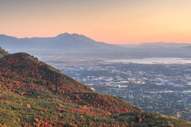 Provo, Utah, USA Provo, Utah, USA view of downtown from Squaw Peak during an autumn dusk. brigham young university stock pictures, royalty-free photos & images