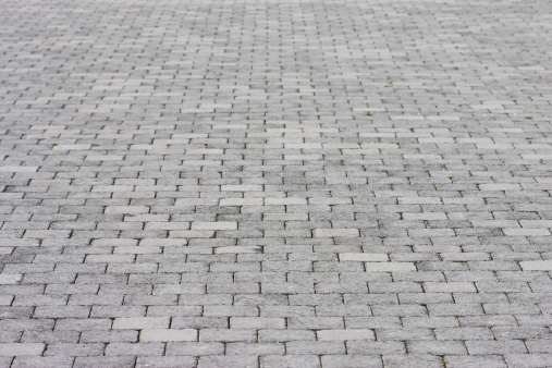Brick pavement footpath background.