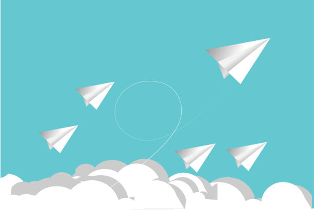 istock Paper plane on blue sky and cloud background. 1183599012