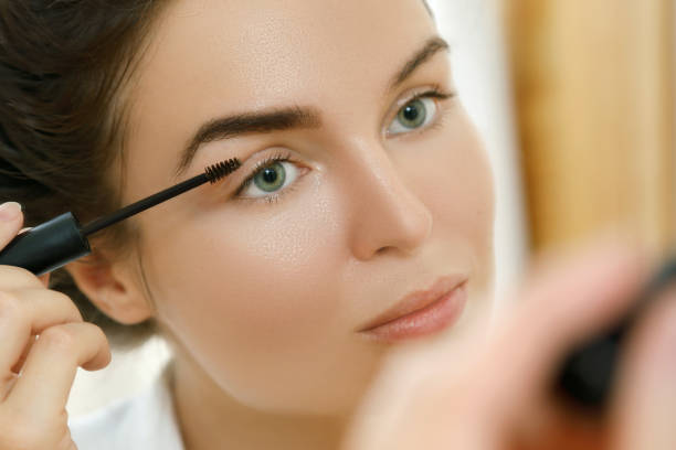 istock Woman applying tinted eyebrow gel 1183601580