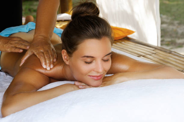 istock Woman during traditional Thai massage 1183605122