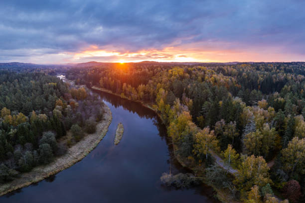 Sunset at river Gauja in autumn next to Ligatne, Latvia