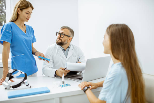 istock Patient at an appointment with otolaryngologist 1183605541