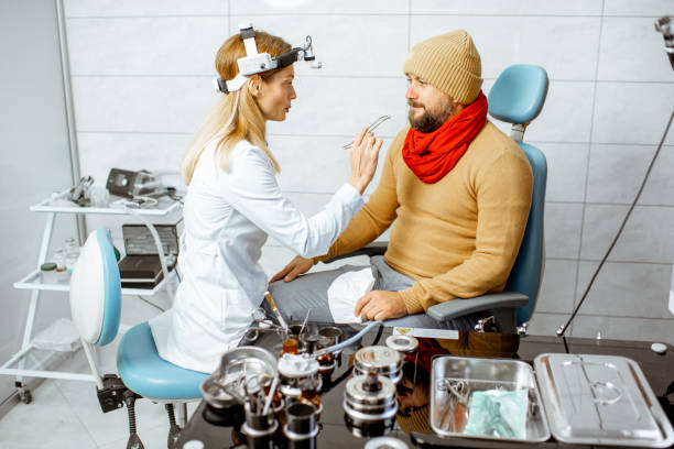 istock Patient with cold on a medical examination at the ENT office 1183606978