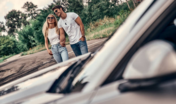 istock Couple near car 1183607060
