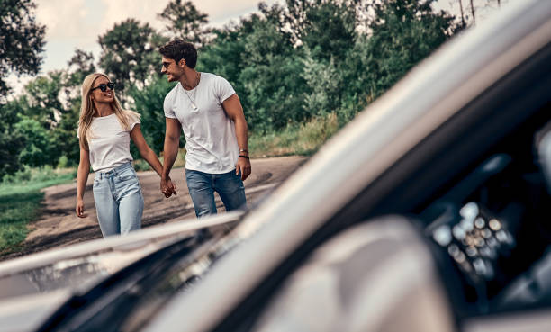 istock Couple near car 1183607064