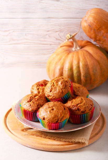 istock Pumpkin muffins with fruits and nuts 1183607285