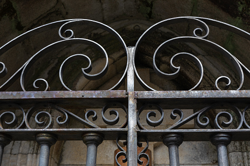Closeup Details of a Black Wrought Iron Fence