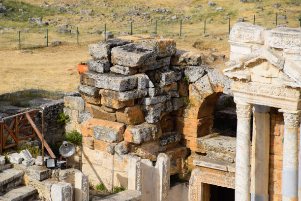 istock Antique columns and arches in the Hierapolis amphitheater. 1183613826