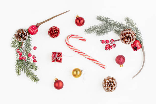 istock Christmas composition with tree branches, red berries, balls and  gifts isolated  on white background. Christmas, winter, New Year concept. Flat lay, Top view. 1183616250