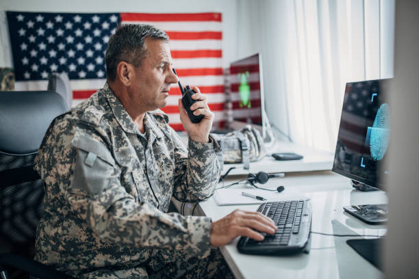 istock Senior soldier using walkie-talkie 1183617259