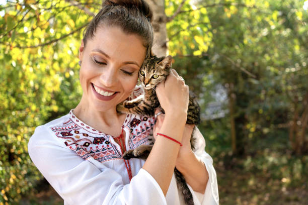 istock Woman with cat at back yard 1183620485