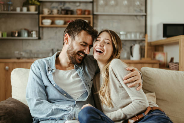 istock Young happy couple having fun at home 1183622330
