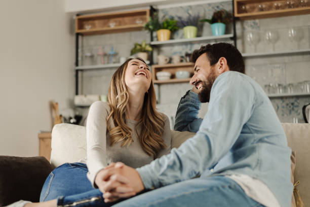 istock Young happy couple having fun at home 1183622380