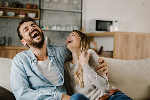 istock Young happy couple having fun at home 1183622422