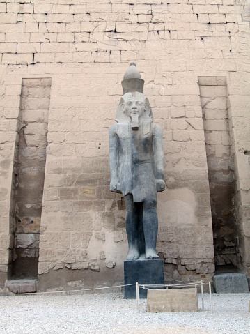 Seated statues of Ramesses II at Luxor Temple in Luxor, Egypt.