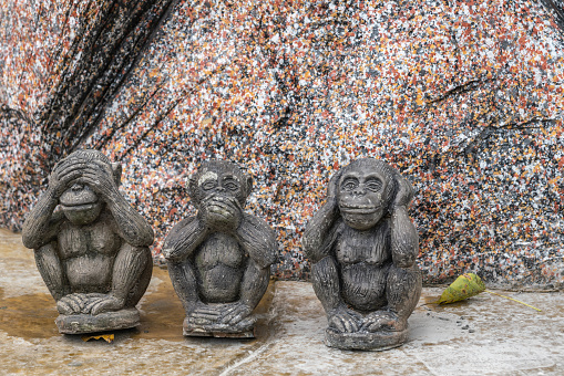Ko Samui Island, Thailand - March 18, 2019: Wat Khunatam Buddhist Temple and monastery. Closeup of classic three wise monkeys statue: see no evil, hear no evil, speak no evil.