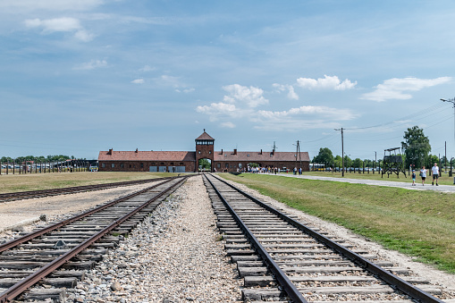 Brzezinka, Poland - July 28, 2019: Rail entrance to Auschwitz II, German Nazi Concentration and Extermination Camp.