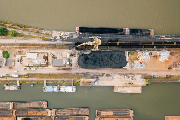 istock Aerial drone photography of a coal loading harbour. 1183632355