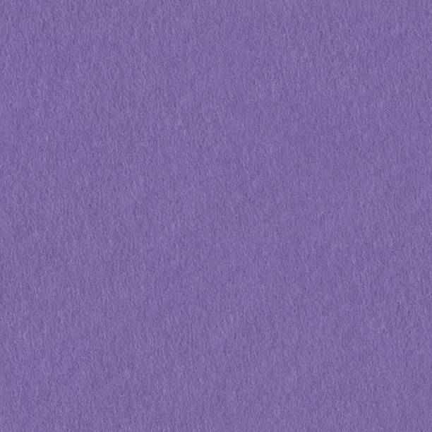 istock Handmade purple felt close-up. Seamless square background, tile ready. 1183633330