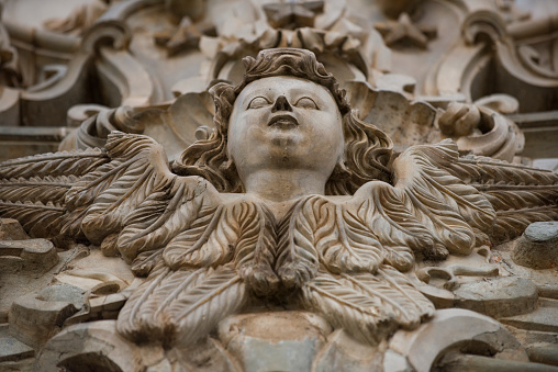 Ouro Preto, Minas Gerais, Brazil - March 05, 2016: Angel sculpture by Aleijadinho (Little Cripple), famous sculptor and architect of Colonial Brazil age