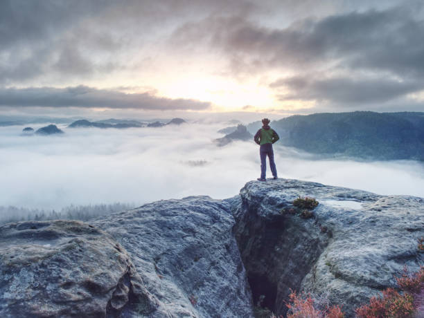 istock Happy beautiful and active man in trekking in fall mountains 1183634460